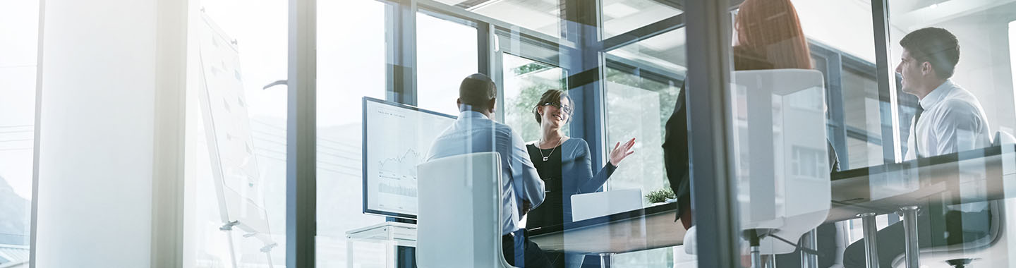 Team talking in meeting room