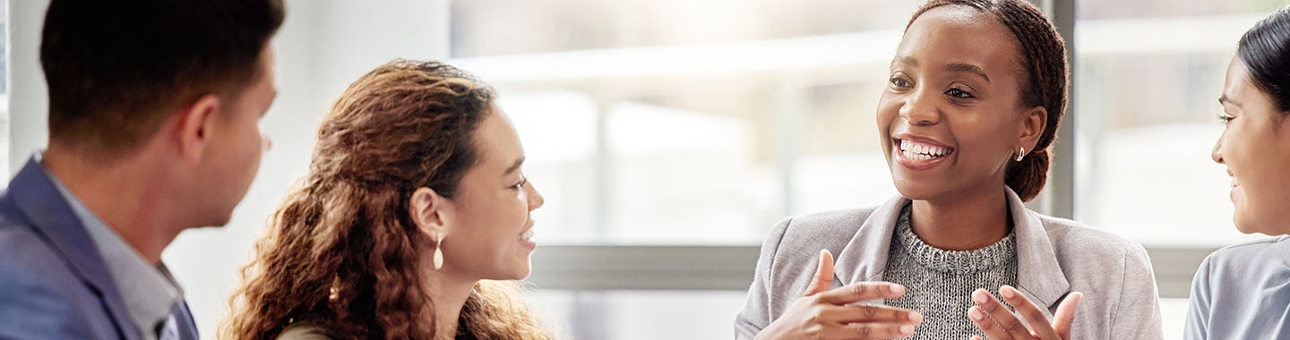 Team sitting together and talking