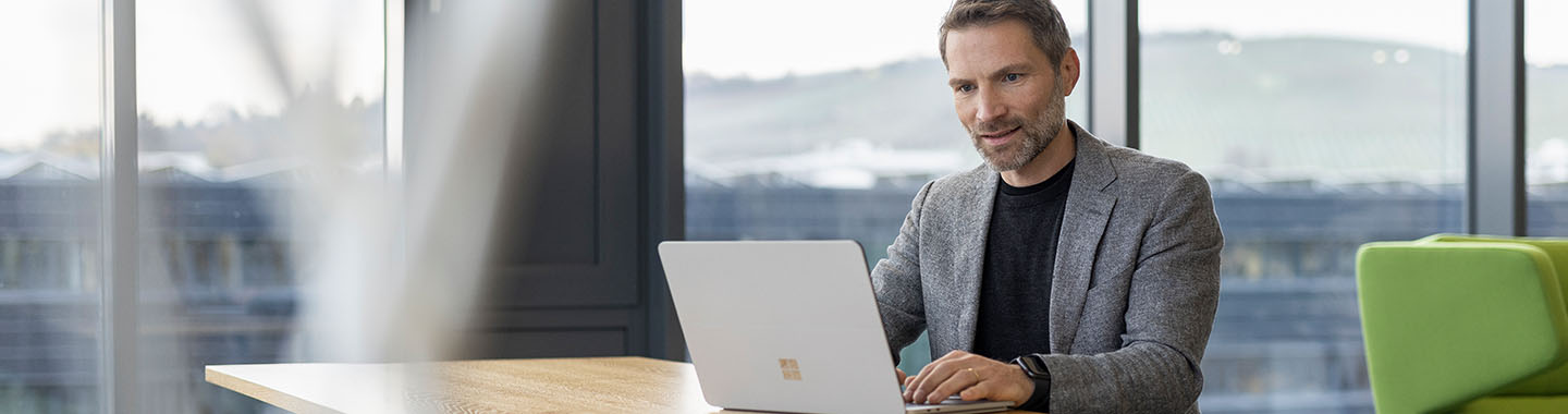 Employee reading news on his notebook