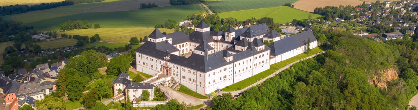 An aerial view of Augustusburg Scharfenstein Lichtenwalde Schlossbetriebe GmbH