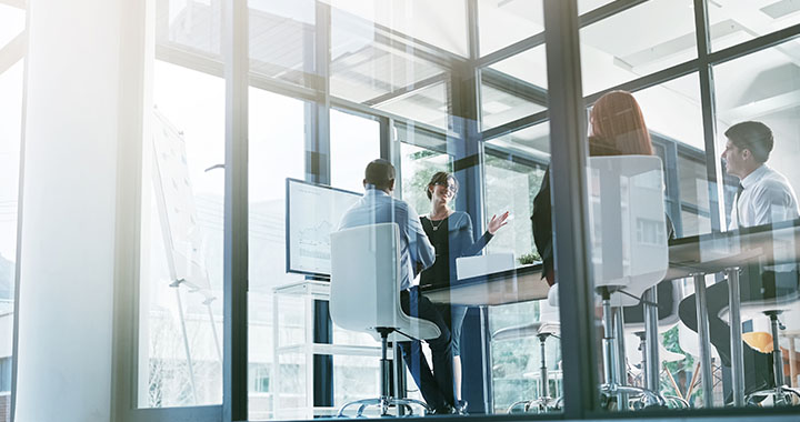 Team talking in meeting room