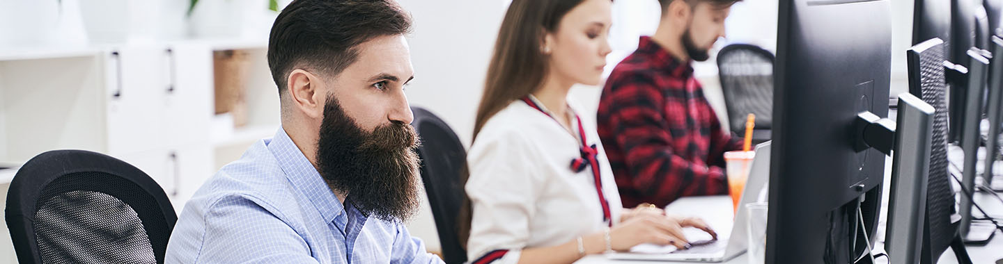 Man working in front of desktop