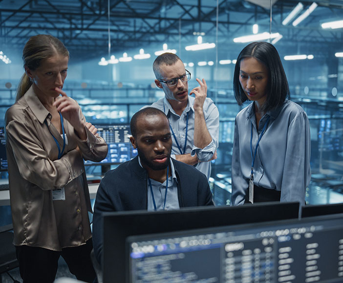 Team starring at monitor