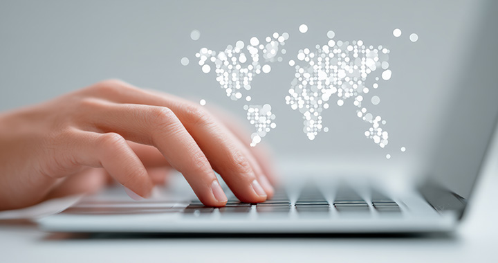 Close-up Laptop with world-map in the background