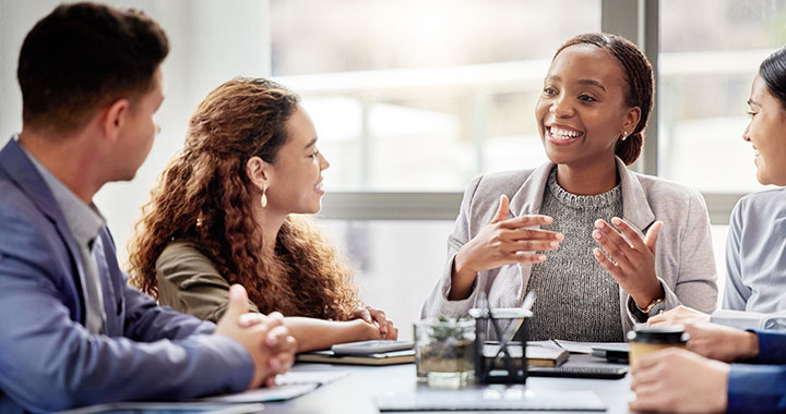 Team sitting together and talking