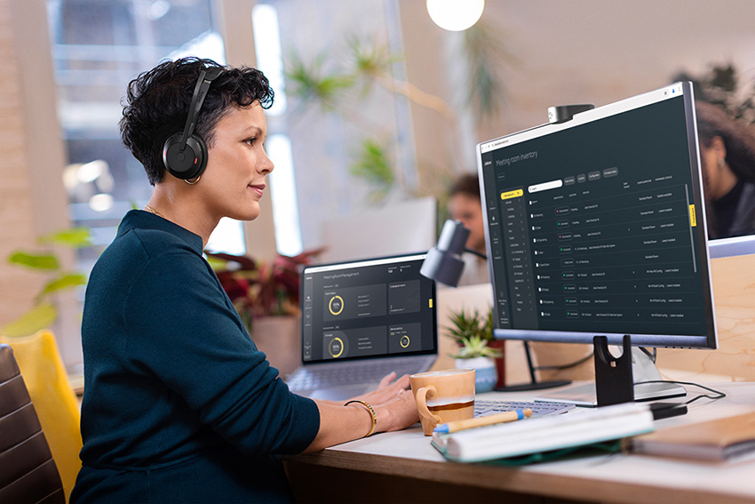 Jabra+ female at office desk